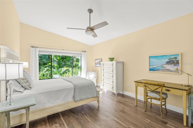 bedroom featuring hardwood / wood-style floors, vaulted ceiling, and ceiling fan