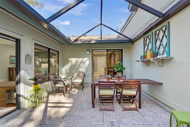 view of patio / terrace with glass enclosure