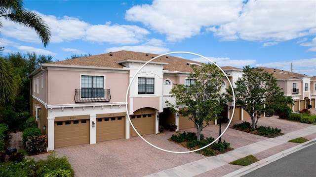 view of front of property with a garage