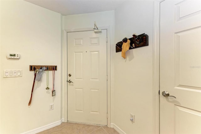 entryway featuring light tile patterned floors