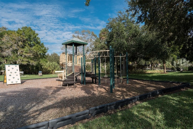 view of jungle gym with a yard