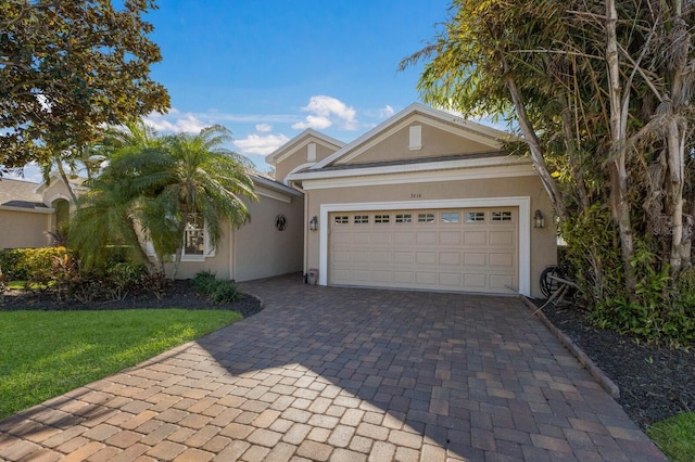 view of front of home with a garage