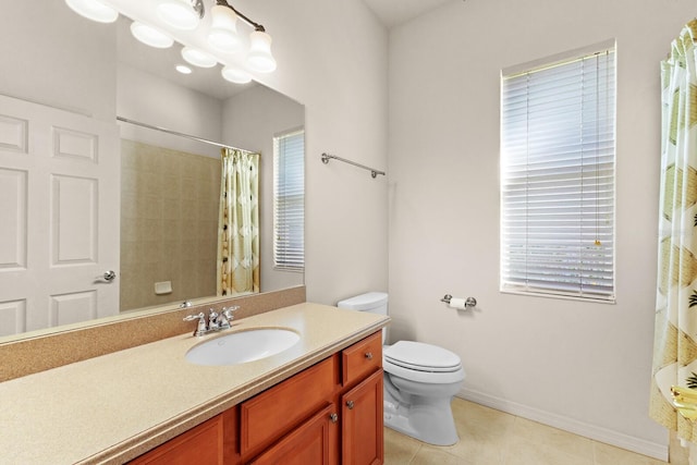 bathroom featuring tile patterned floors, curtained shower, vanity, and toilet