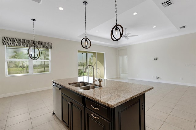 13789 Old Creek Ct, Parrish, FL 34219 - kitchen featuring stainless steel dishwasher, light tile patterned flooring, a tray ceiling, pendant lighting, and recessed lighting