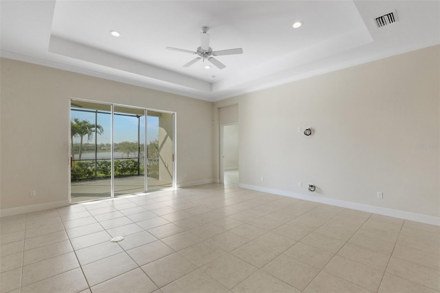 13789 Old Creek Ct, Parrish, FL 34219 - unfurnished room featuring a tray ceiling, ceiling fan, recessed lighting, and light tile patterned floors