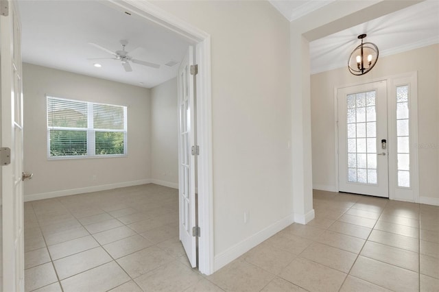 13789 Old Creek Ct, Parrish, FL 34219 - foyer entrance with light tile patterned floors, crown molding, a chandelier, ceiling fan, and recessed lighting