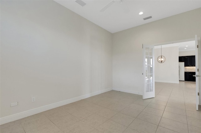 13789 Old Creek Ct, Parrish, FL 34219 - empty room with light tile patterned flooring, a ceiling fan, a chandelier, and recessed lighting