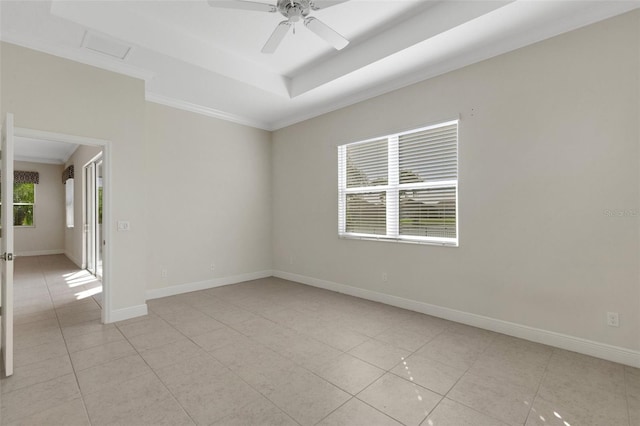 13789 Old Creek Ct, Parrish, FL 34219 - unfurnished room with light tile patterned floors, crown molding, a ceiling fan, and a tray ceiling