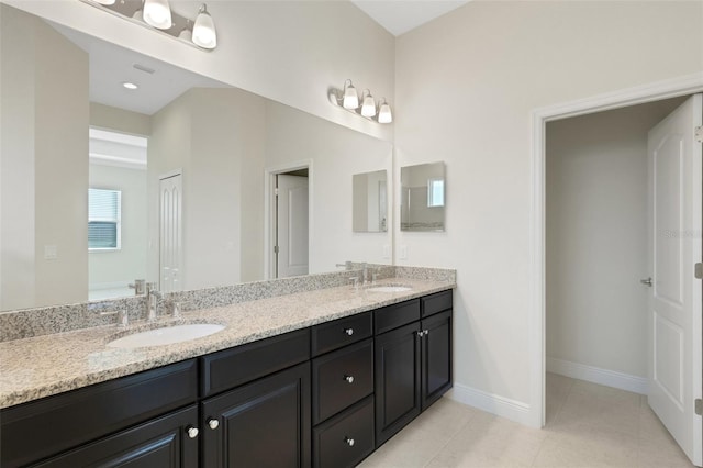 13789 Old Creek Ct, Parrish, FL 34219 - bathroom featuring double vanity and tile patterned floors
