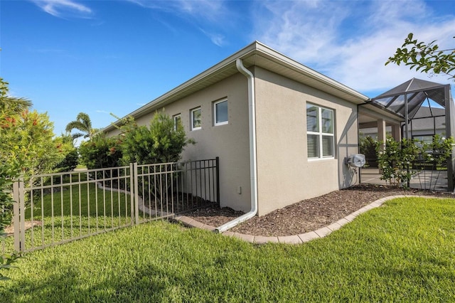 13789 Old Creek Ct, Parrish, FL 34219 - view of property exterior with stucco siding and glass enclosure