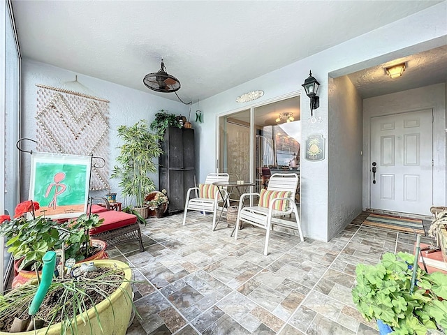 view of patio / terrace featuring ceiling fan