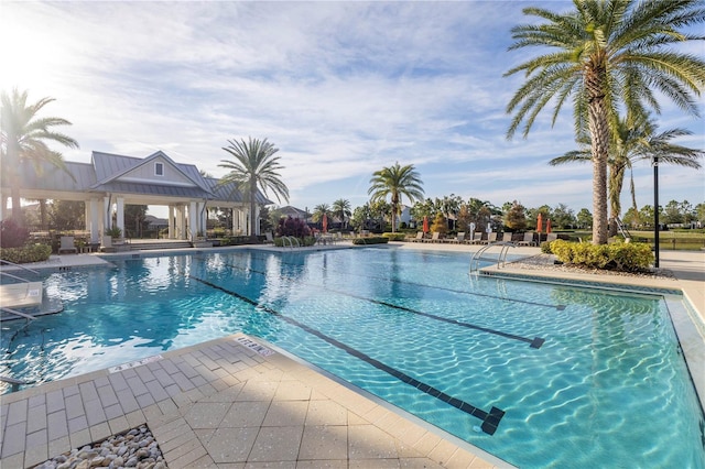 view of swimming pool with a patio area