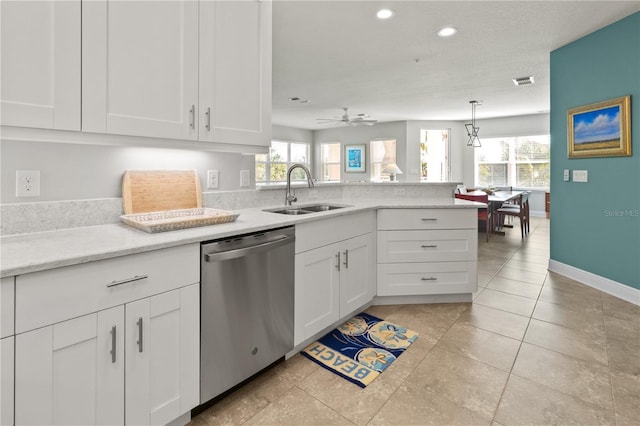 kitchen with ceiling fan, stainless steel dishwasher, plenty of natural light, and sink