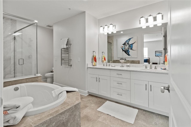 full bathroom featuring separate shower and tub, vanity, and toilet