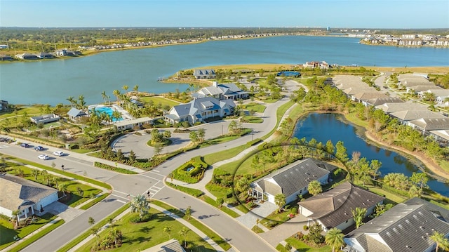 birds eye view of property featuring a water view