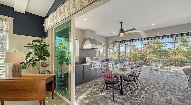 interior space featuring ceiling fan