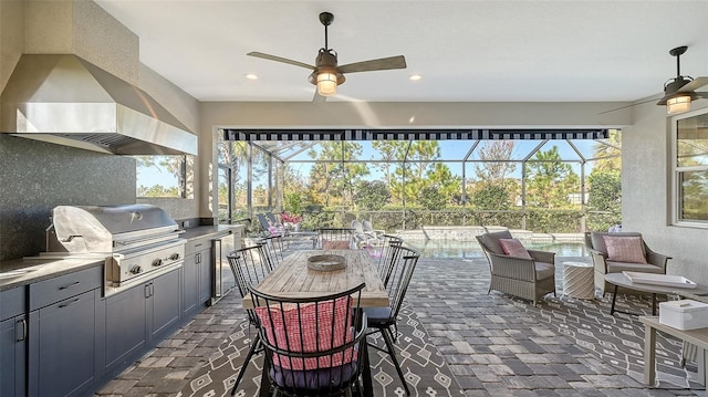 view of patio / terrace featuring area for grilling, a lanai, pool water feature, a fenced in pool, and a grill