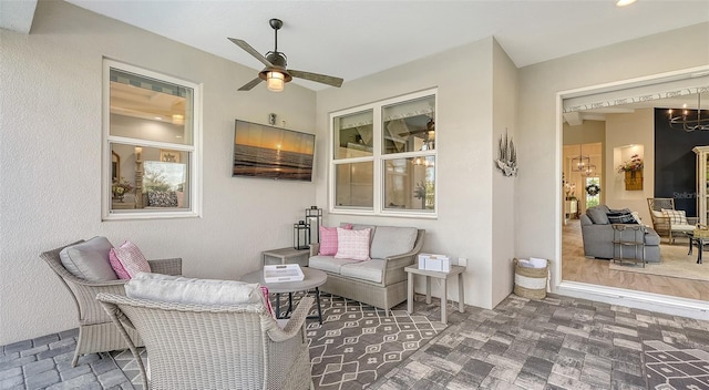 view of patio featuring ceiling fan