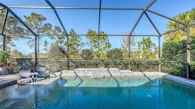 view of pool featuring a patio area and a lanai