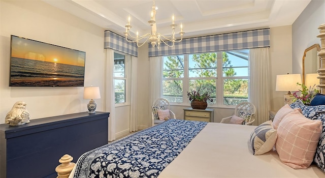 bedroom featuring an inviting chandelier