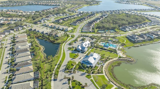 birds eye view of property featuring a water view