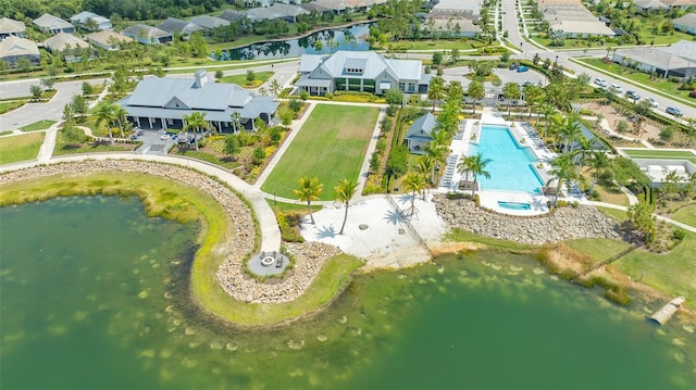 bird's eye view with a water view