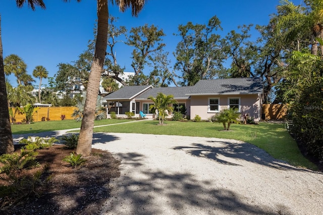 view of front of home featuring a front yard