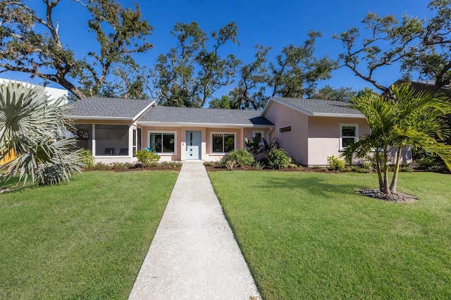 ranch-style house featuring a front yard