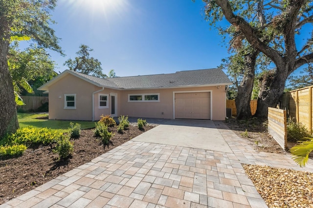 ranch-style home with a garage