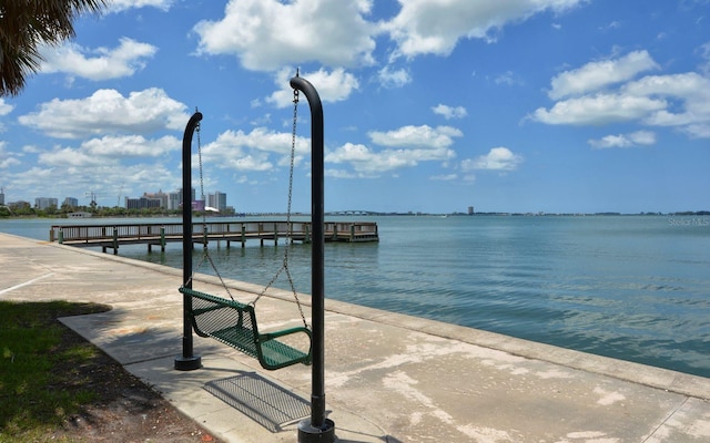 dock area featuring a water view