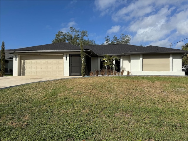 single story home featuring a front lawn and a garage