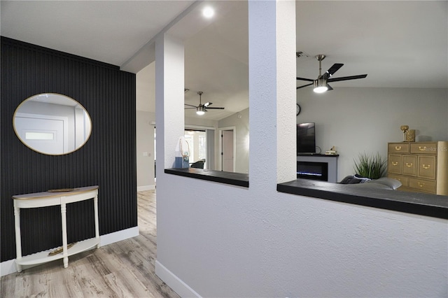 interior space featuring ceiling fan