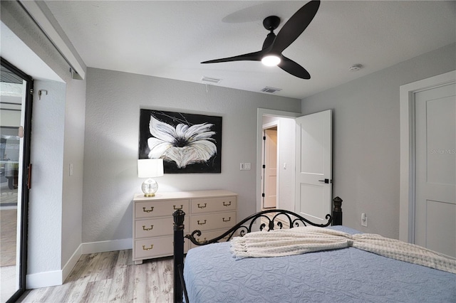 bedroom with access to outside, light hardwood / wood-style floors, and ceiling fan