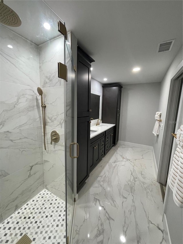 bathroom with vanity and an enclosed shower