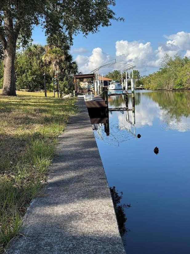 3479 Knox Ter, Port Charlotte, FL 33948 - dock area featuring a water view