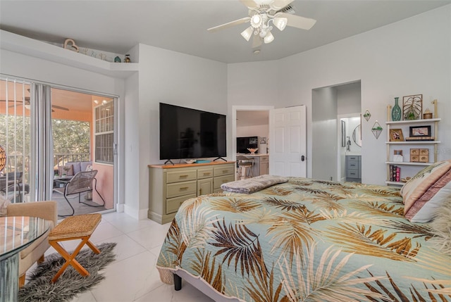 tiled bedroom featuring ceiling fan and access to exterior