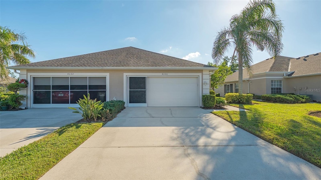 ranch-style house with a front lawn