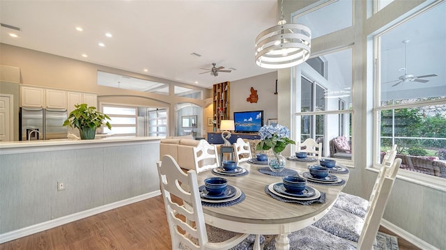 8334 Sailing Loop, Lakewood Ranch, FL 34202 - dining area featuring a ceiling fan, healthy amount of natural light, light wood-style flooring, and recessed lighting