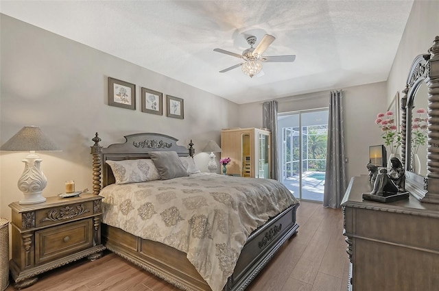 bedroom featuring access to outside, ceiling fan, and hardwood / wood-style floors