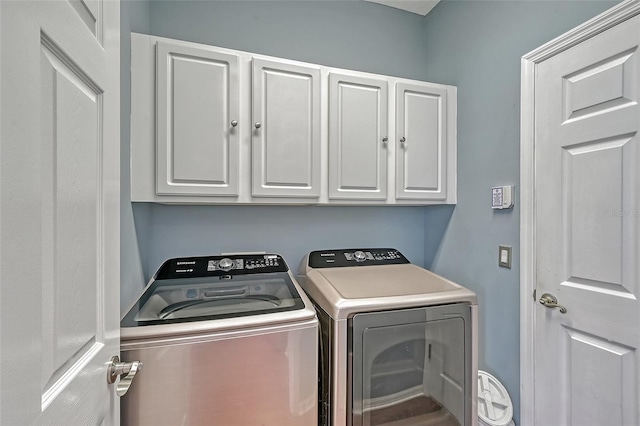 8334 Sailing Loop, Lakewood Ranch, FL 34202 - laundry room with cabinet space and independent washer and dryer