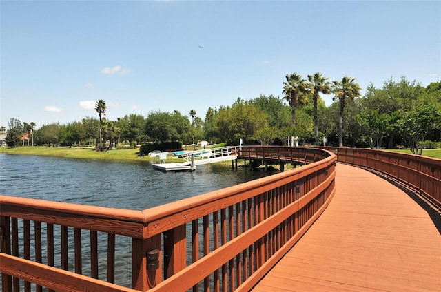 8334 Sailing Loop, Lakewood Ranch, FL 34202 - dock area with a water view and view of wooded area