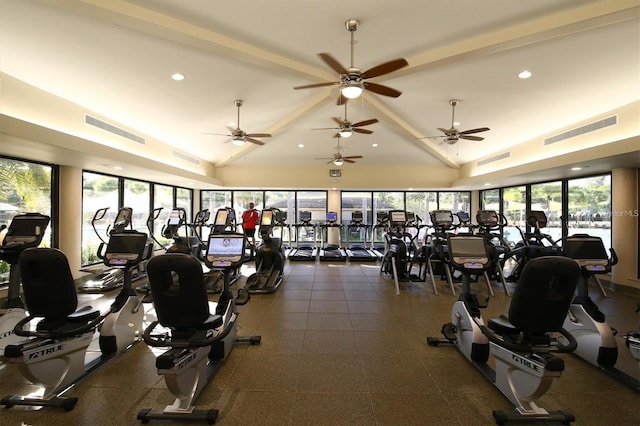 exercise room with ceiling fan and lofted ceiling