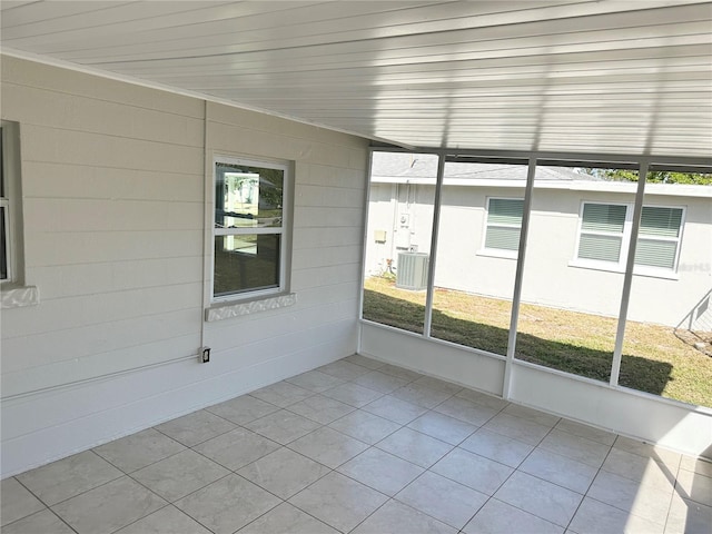 unfurnished sunroom with wooden ceiling