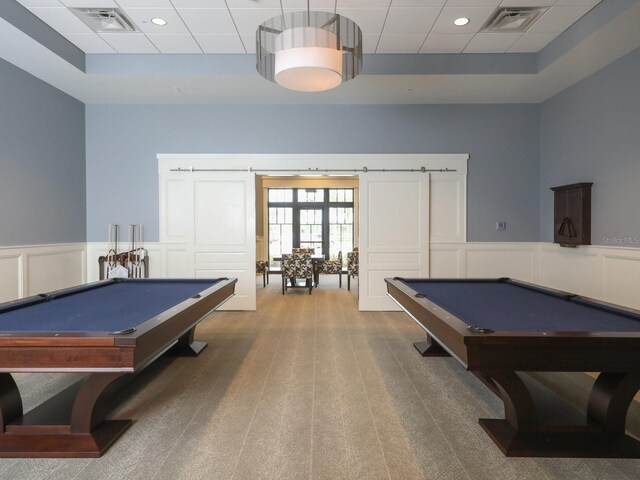 game room featuring carpet floors, french doors, billiards, and a tray ceiling