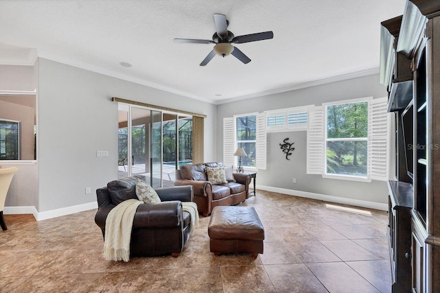 living room featuring ceiling fan, light tile patterned floors, and ornamental molding