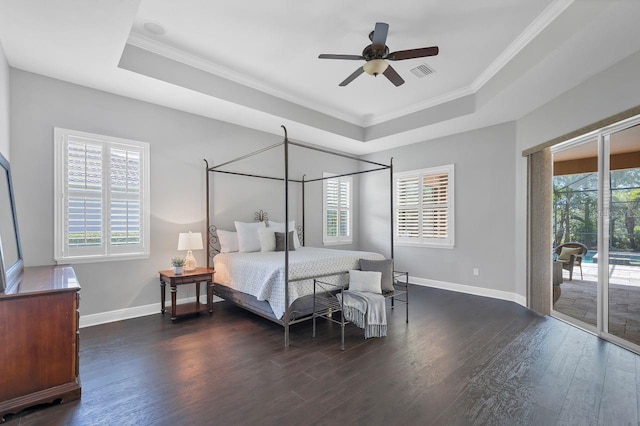 bedroom with access to exterior, dark hardwood / wood-style floors, multiple windows, and ceiling fan