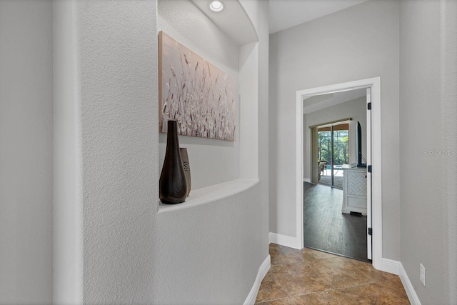 hall with light hardwood / wood-style floors