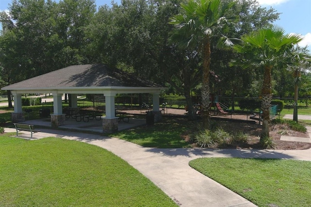 view of home's community with a gazebo and a lawn