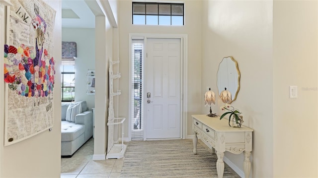 entryway featuring light tile patterned flooring