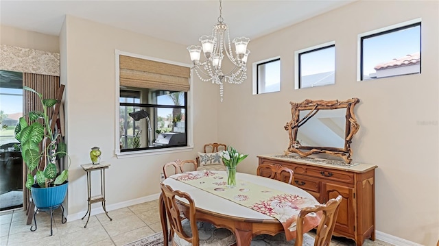 tiled dining area with plenty of natural light and a chandelier